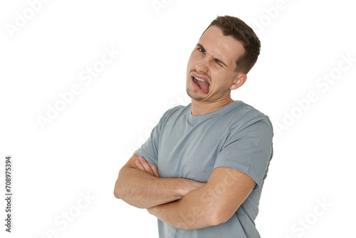 young man shows her toung, feels disgust on white background.