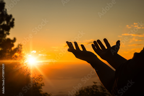 Person hands open palm up worship. Eucharist therapy bless god helping repent catholic easter lent mind pray. Fighting for god. Silhouette of woman worship in morning. Christian religion concept.