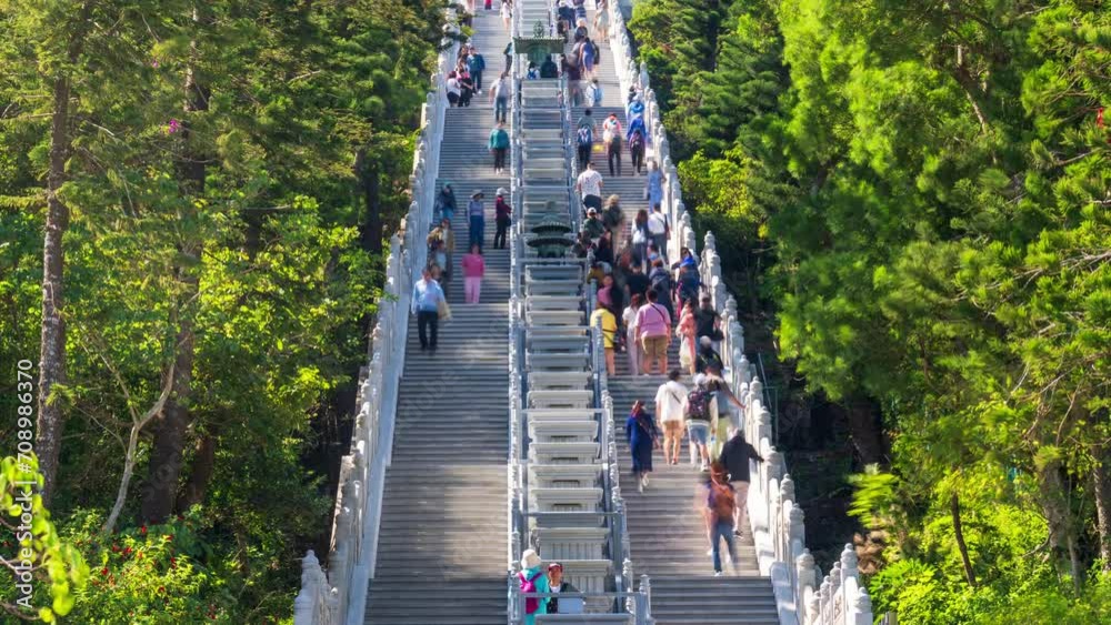 Hong Kong Time Lapse 4K Tourists walk the street at the Big Buddha Ngong Ping