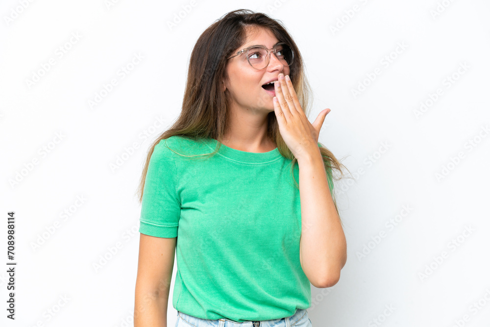 Young caucasian woman isolated on white background yawning and covering wide open mouth with hand Young caucasian woman isolated on white background yawning and covering wide open mouth with hand