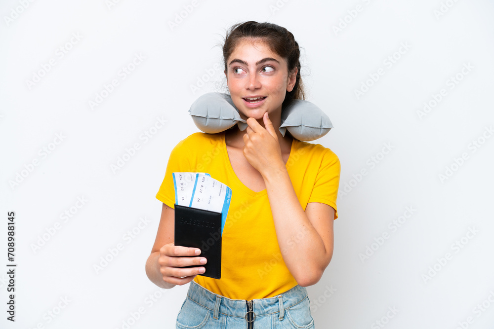 Young caucasian woman with Inflatable travel pillow isolated on white background looking to the side and smiling Young caucasian woman with Inflatable travel pillow isolated on white background looking to the side and smiling