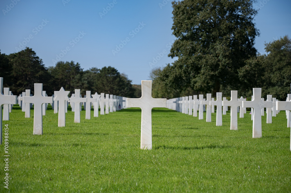 Closeup of a white cross from the Normandy American Cemetery.