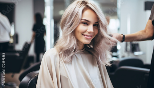 A Beautiful Blonde Model Woman in the Hairdresser Salon