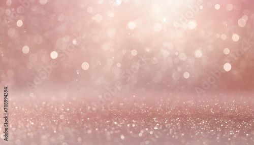 rosegold glitter abstract backgrounf of glitter bokeh with light glitter and diamond dust subtle tonal variations photo