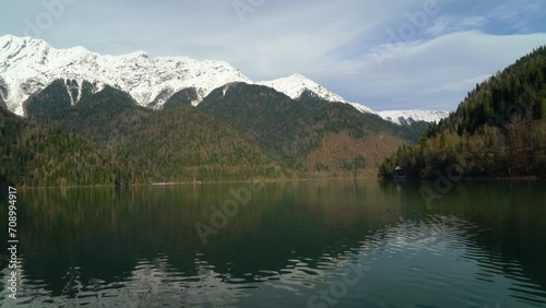 Abkhazia Lake Ritsa, alpine lake in the Caucasus mountains photo