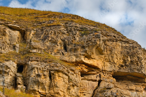Russia, the North Caucasus. Fragments of steep cliffs with an unusual texture in the Chegem gorge.