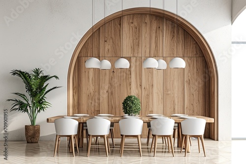 Minimalist interior design of a modern diming room with curved alcove and hanging lights. Wood grain and white tone. photo
