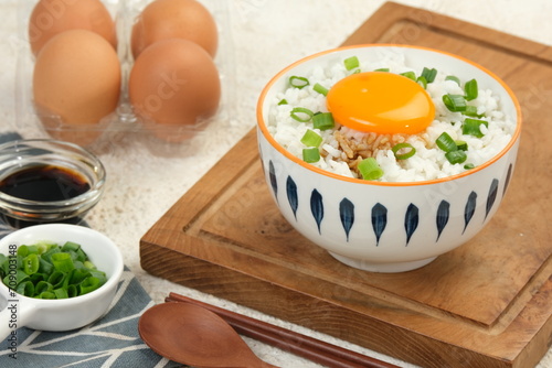 Fotografie tamago kake gohan or Japanese warm rice with a raw egg