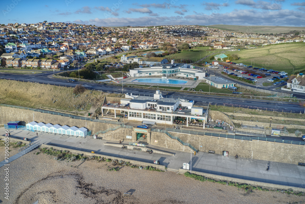 Aerial photo of the Saltdean art deco Lido and the WhiteCliffs Saltdean Cafe on the seafront in East Sussex England. Aerial photo of the Saltdean art deco Lido and the WhiteCliffs Saltdean Cafe on the seafront in East Sussex England.