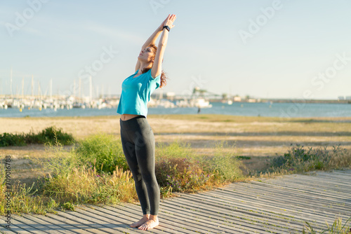 Young woman at outdoors doing yoga