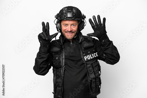 Middle age SWAT man isolated on white background counting eight with fingers