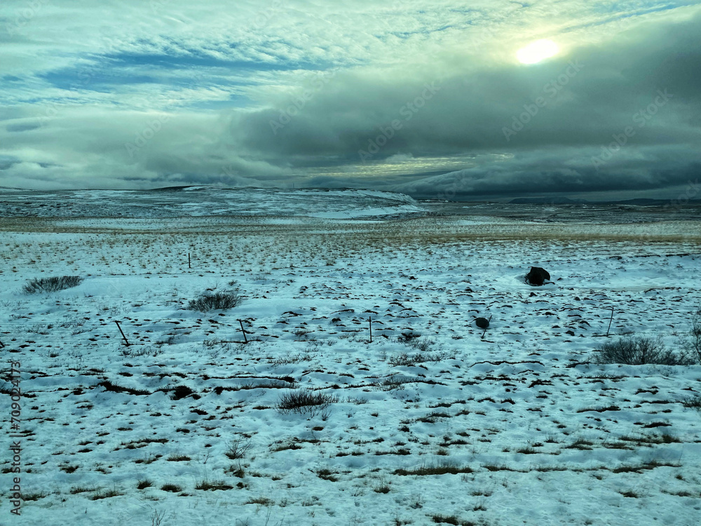 Fototapeta premium A view of the Iceland Countryside in the winter covered with Snow and Ice