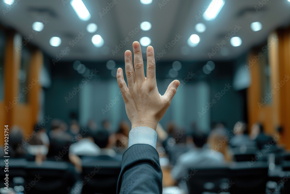 Photo of people asking questions or making presentations, journalists raising their hands in the audience - obrazy, fototapety, plakaty 