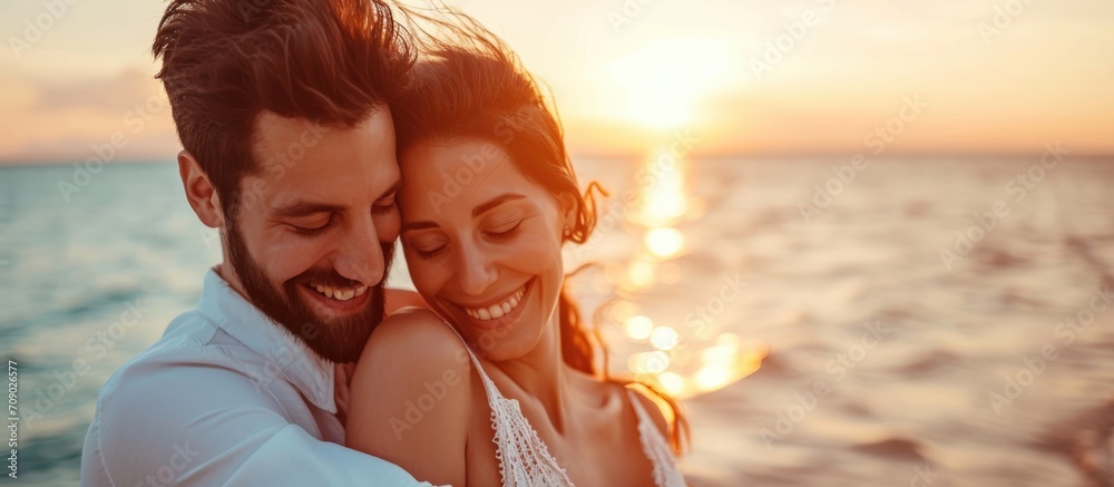 Fototapeta premium Happy couple outdoors, embracing joyfully on their honeymoon, connecting and bonding in a loving commitment, caring for their romantic relationship.