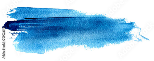 Abstract art of a vibrant blue paint stroke with dynamic splatters, isolated on transparent or white background photo