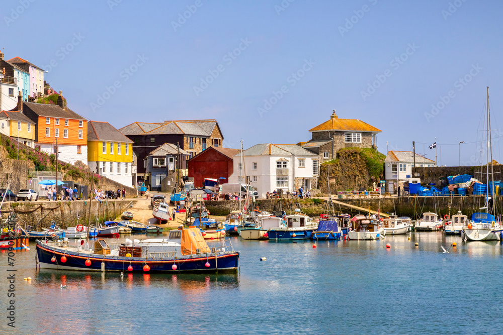 Mevagissey, Cornwall - The harbour and historic buildings on a bright sunny spring day,