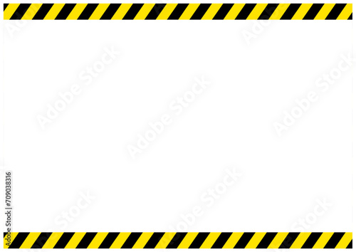 災害工事現場で使う黄色と黒の危険注意の警告フレーム枠縦 photo