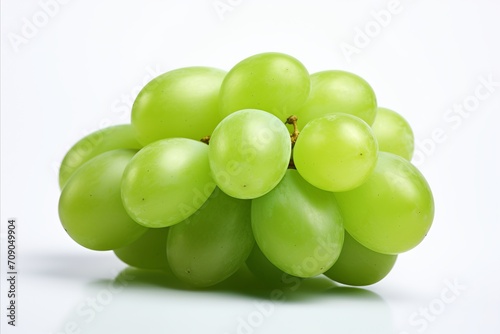 Fresh and juicy green grape isolated on white background with high detail for advertising purposes