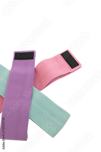 Fitness elastic bands of different colors for exercises.