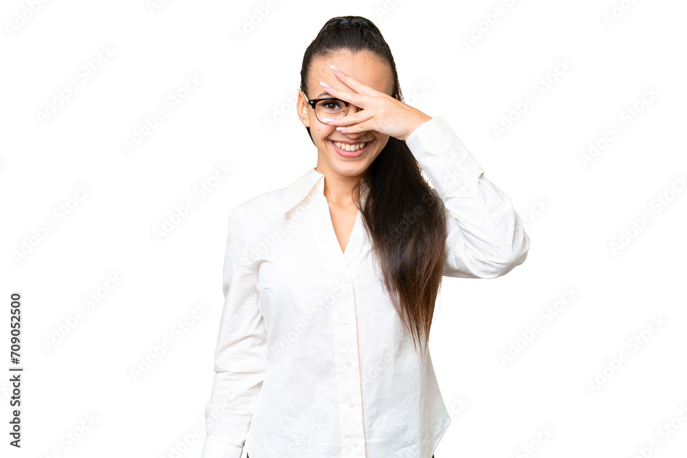 Young Arabian woman over isolated chroma key background covering eyes by hands and smiling Young Arabian woman over isolated chroma key background covering eyes by hands and smiling