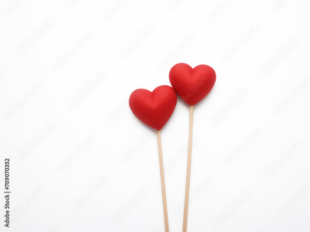 two red heart lollipops on white background for Valentines Day