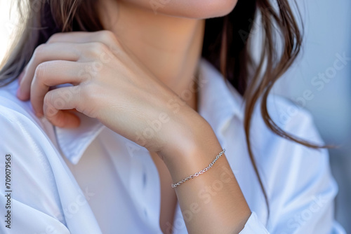 close-up of a woman wrist with a bracelet photo