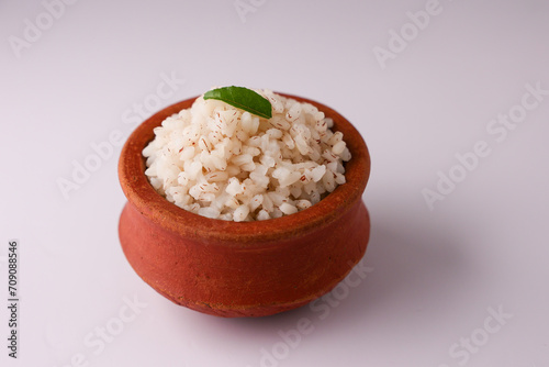 Brown Rice or Kerala boiled rice. Traditional Onam sadhya rice popular with Sambar, Rasam, parippu dal curry ghee Vishu Pongal Diwali festival vegetarian food Kerala Tamil Nadu South India. photo