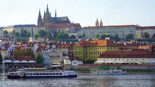 Czech Republic, Prague, September 2023: View from Charles Bridge to Prague Castle, the Vltava River, St. Vitus Cathedral. Concept - tourism, travel.