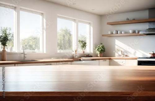 Empty wooden table top counter near a big window. Wood tabletop over defocused kitchen background. Trendy stylish desk space for product presentation  blur light modern cooking interior. 