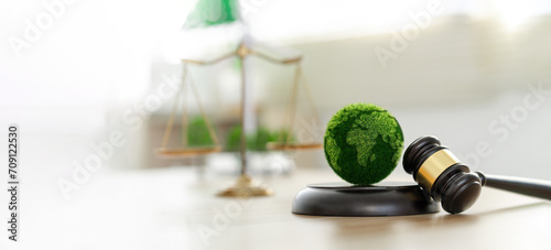 Green law concept. international environmental law Climate or environmental justice Law on green forest conservation economy Environmental protection. Legal hammer placed on the desk