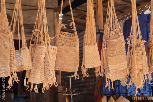 bag crafts made from the roots and bark of a tree typical of the Indonesian Baduy tribe called koja photo