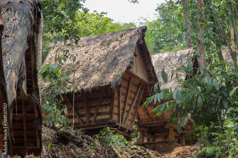 traditional Baduy rice storage construction called leuit. made of wood, bamboo booths and roofed with sago leaves and palm fiber traditional Baduy rice storage construction called leuit. made of wood, bamboo booths and roofed with sago leaves and palm fiber