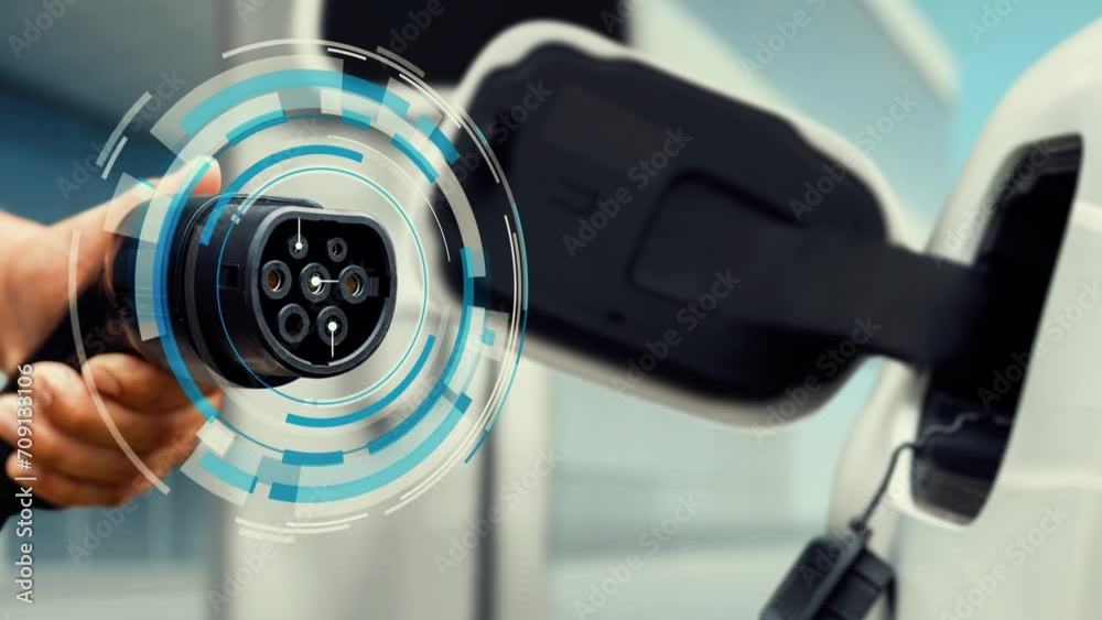 Vidéo Stock Focus EV charger pointing in front of camera display