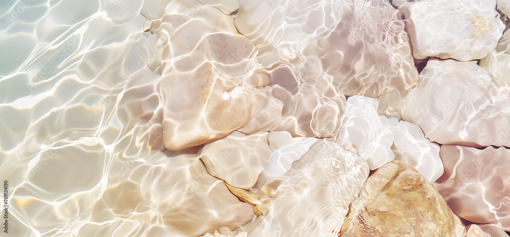 texture transparent clear waters of the sea lake. White stones with sun lights shadow in clear water. Sea stones in the sea water. Pebbles under water. top view. abstract spa background concept texture transparent clear waters of the sea lake. White stones with sun lights shadow in clear water. Sea stones in the sea water. Pebbles under water. top view. abstract spa background concept