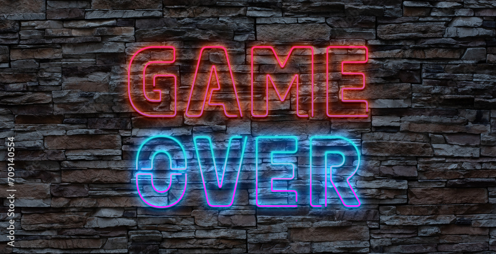 Fototapeta premium Game Over Neon Text Vector with a Brick Wall Background design template modern trend design night neon signboard night bright advertising light banner light art. Vector Illustration.