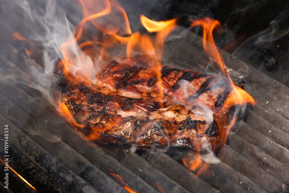 Searing and smoking ribeye steaks on grill Searing and smoking ribeye steaks on grill