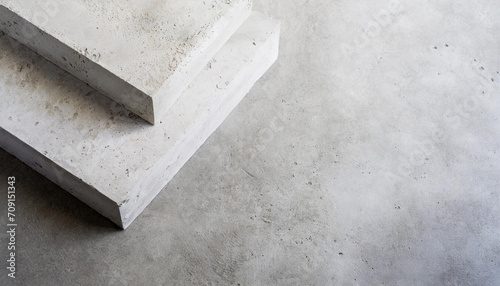Top view of a smooth concrete pedestal on a textured concrete table. Ideal for product display or food presentations, flatlay background. © LADALIDI