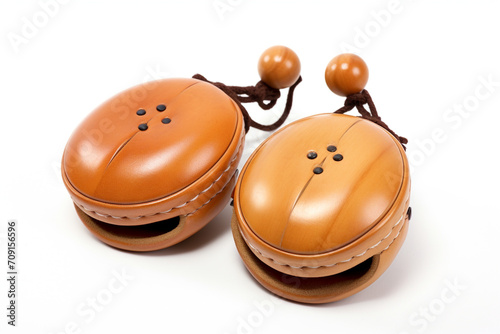 Play Castanets isolated on white background created with Generative Ai © Andrii Yablonskyi