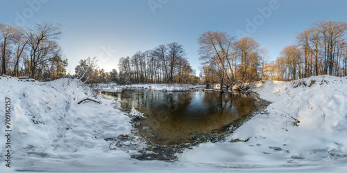winter full spherical hdri 360 panorama view in snowy forest near river with blue evening sky in equirectangular projection. VR AR content