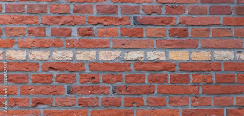 dark texture of old red bricks wall background