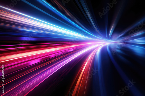 Colorful light trails with motion effect on black background.