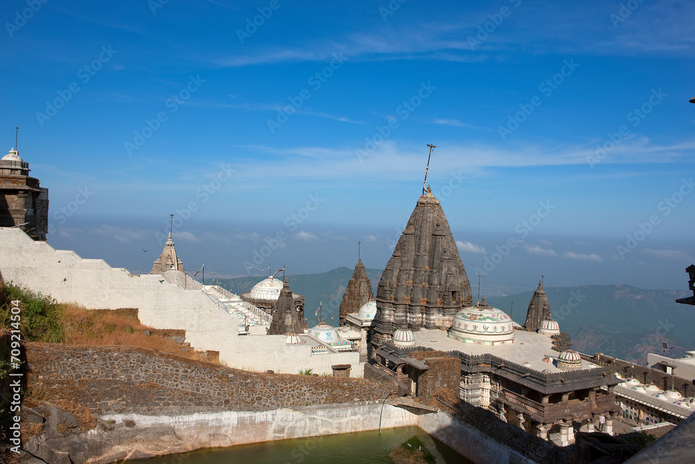 India temple town of Girnar on a sunny autumn day. India temple town of Girnar on a sunny autumn day.