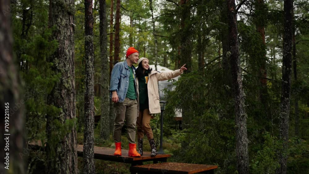 Pair Of Tourists In Nature, Resting In Camping In Pine Forest, Eco-Tourism And Traveling Pair Of Tourists In Nature, Resting In Camping In Pine Forest, Eco-Tourism And Traveling