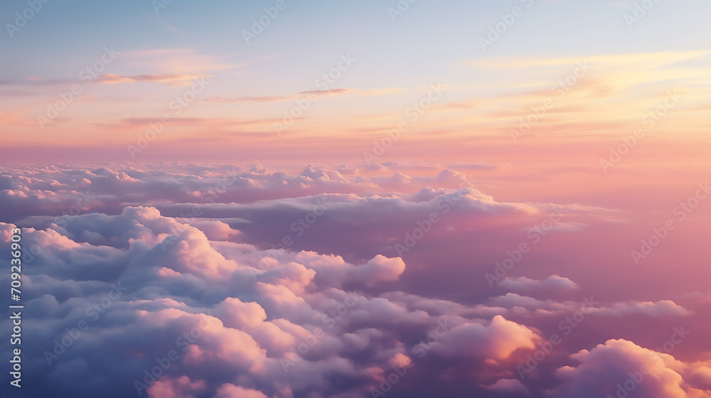 Sky with clouds at twilight, dusk, dawn, flying above the clouds, over the clouds