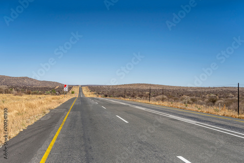 tar road in barren countryside, near Karibib, Namibia