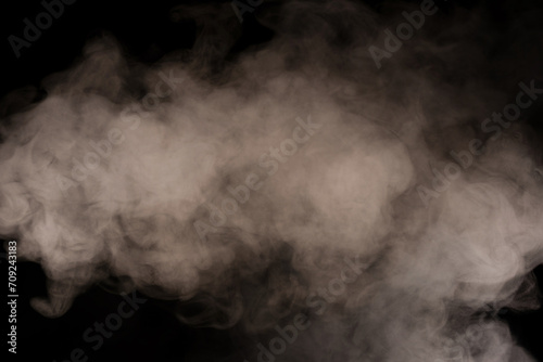 White steam on a black background.