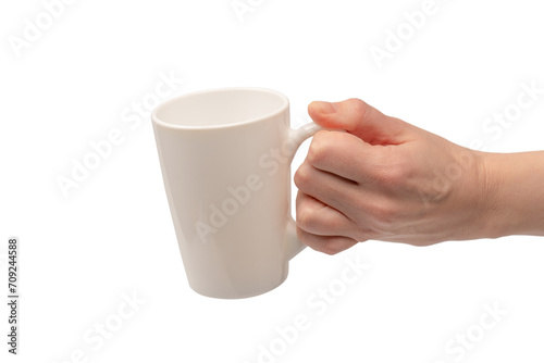 Female hand is holding tea cup isolated on a white background.