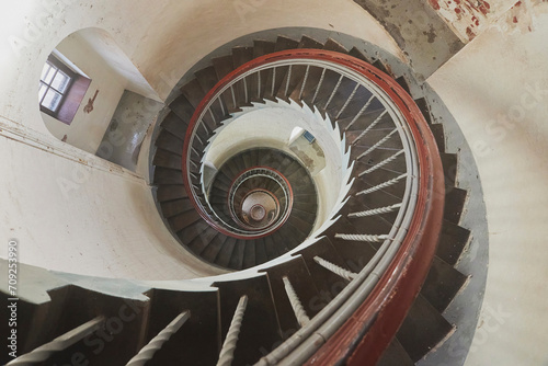 Spiral staircase inside an ancient lighthouse in Denmark