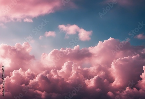 Beautiful background image of a romantic blue sky with soft fluffy pink clouds Panoramic natural vie