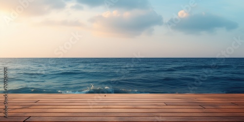Sea background with empty wooden deck table. Ready for montaged product display.